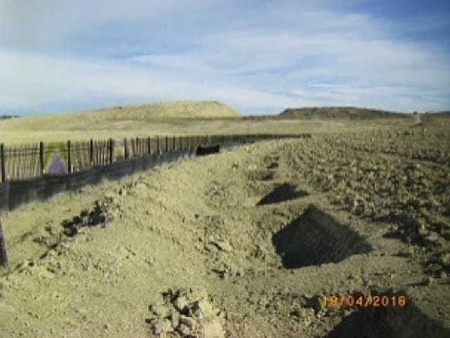 Check dams used to slow runoff on an AESC project